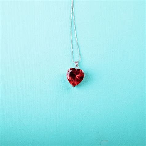 Premium Photo | Red heart, jewelry