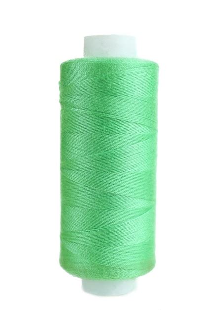 Premium Photo | Colored spool of thread isolated on white