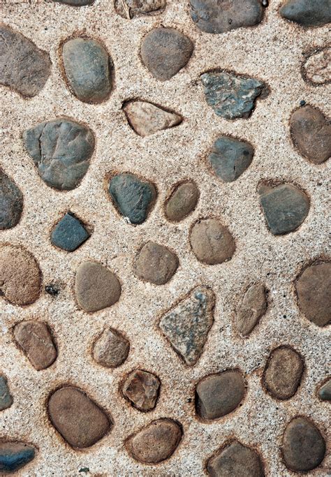 Rocks In The Concrete Path Background Texture