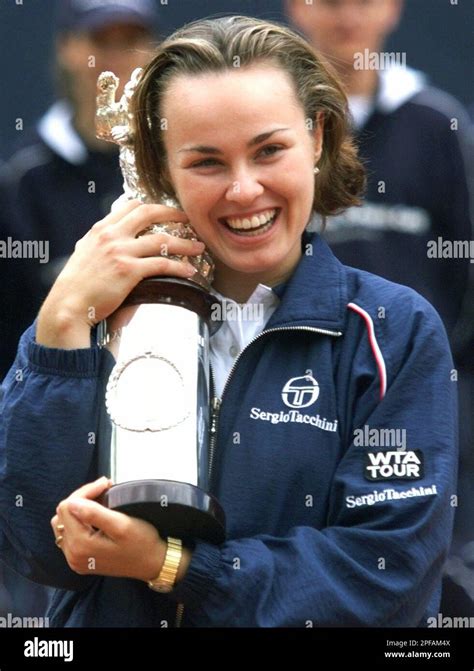 Tennis Star Martina Hingis Of Switzerland Holds Trophy After Winning