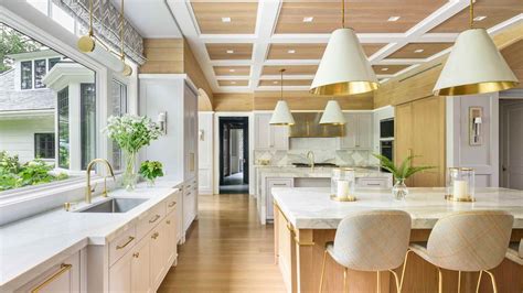 White Kitchen with Gold and Light Wood - Nine Points WoodWorking