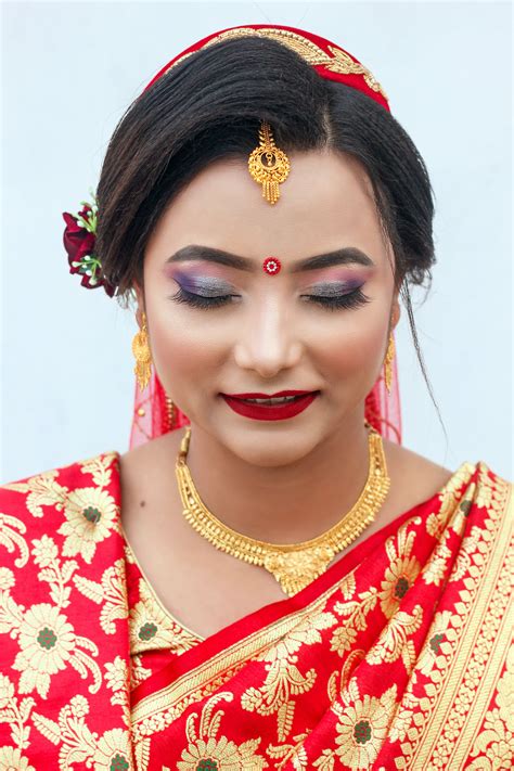 Shallow Focus Photography Of Woman Wearing Blue And Gold Dress · Free