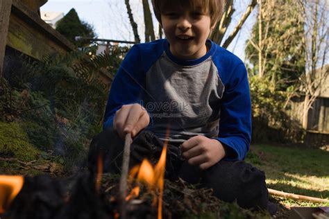 Boy Playing With Fire Picture And HD Photos | Free Download On Lovepik