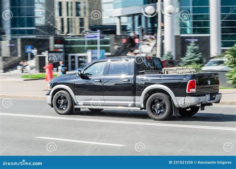 Dodge Ram 1500 Fourth Generation Is Driving On Street In Centre Of City