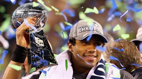 Russell Wilson holding his first of many Super Bowl trophies. Super ...