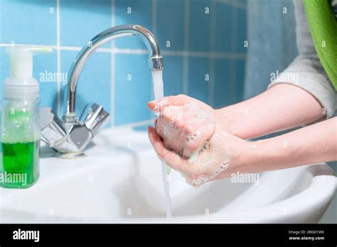 Woman Washes Hands With Liquid Antibacterial Soap Virus Prevention