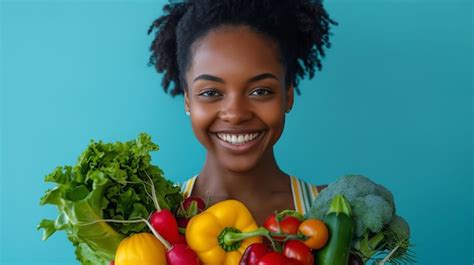 Premium Photo A Woman Holding A Bunch Of Vegetables