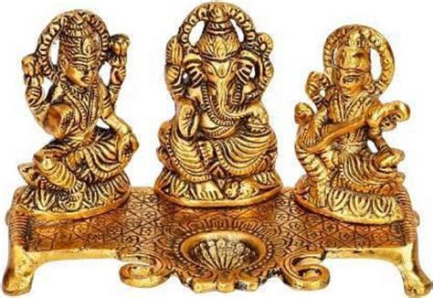 Fashion Bizz Gold Metal Lakshmi Ganesha Saraswati Idol With Diya