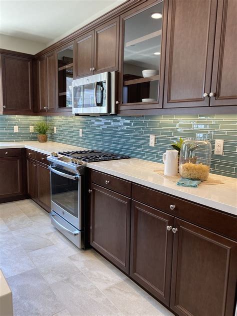 Kitchen Dark Cabinets White Quartz Countertop Aqua Backsplash In