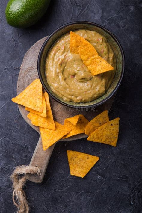 Corn Nacho Chips And Avocado Dip Guacamole In Bowl Stock Photo Image