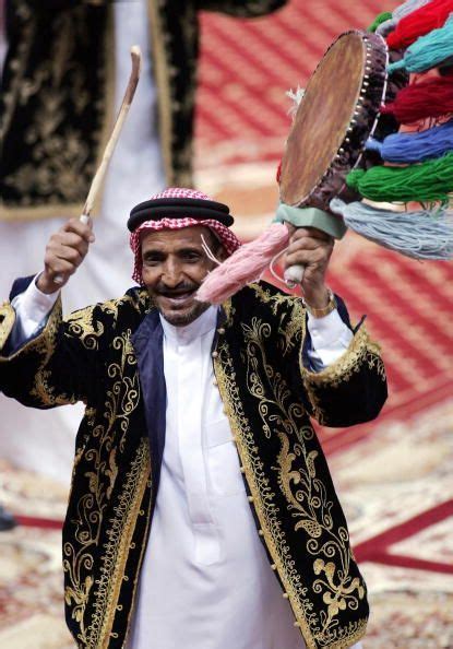 A Saudi Man Performs The Traditional Arda Dance Or War Dance During The Janadriyah Festival Of