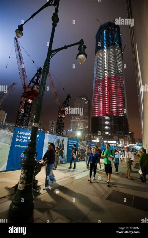 The under construction One World Trade Center is illuminated in red, white and blue lights for ...