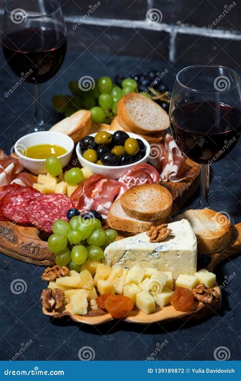 Cheese Platter Bread Fruit And Cold Cuts To Wine Vertical Closeup