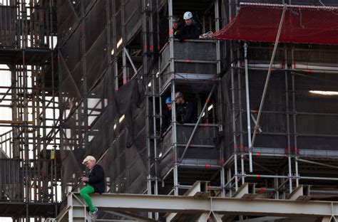 Extinction Rebellion Protester Dressed As Boris Johnson Climbs Big Ben