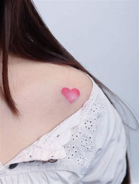 Small pink heart tattoo - Tattoogrid.net