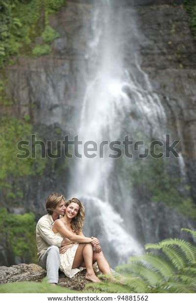 Couple Hugging By Waterfalls Stock Photo 94881562 Shutterstock