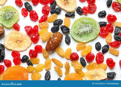 Different Dried Fruits On White Background Top View Stock Photo