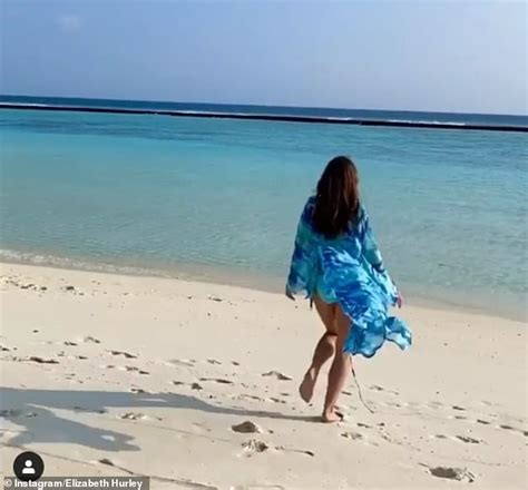 Elizabeth Hurley 54 Shows Off Her Phenomenal Figure In A Tiny Red Bikini Daily Mail Online