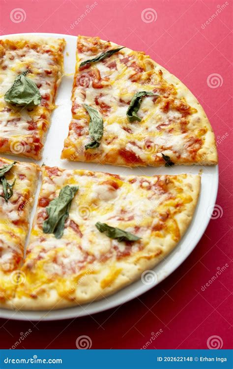 Classic Cheese Pizza Over Colourful Red Background With Copy Space