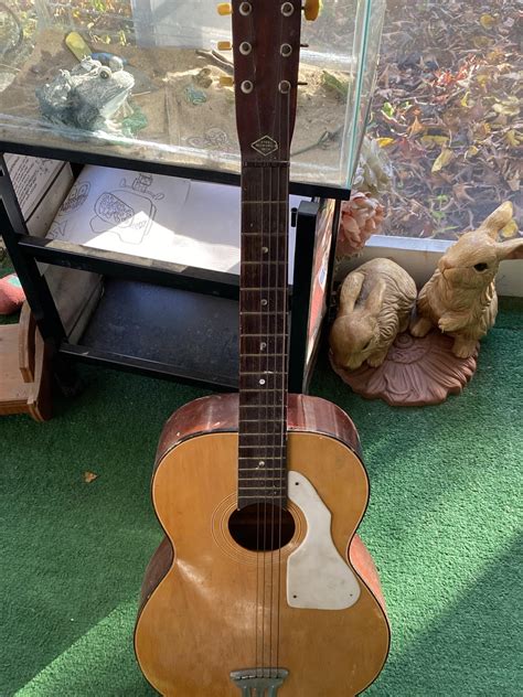 Found This Old Guitar In The Wall Of My Grandmas Basement And Cant