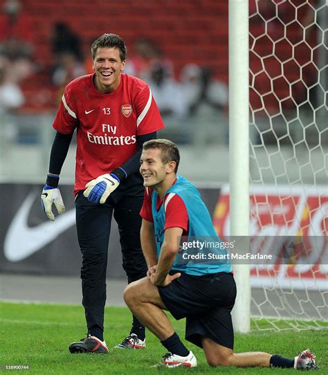 Wojciech Szczesny And Jack Wilshere Of Arsenal Smile During An Open