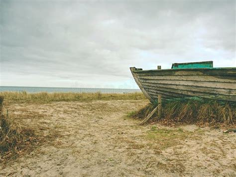 Abandoned Wrecked Boat Stuck In Sand Old Wooden Boat On The Sandy