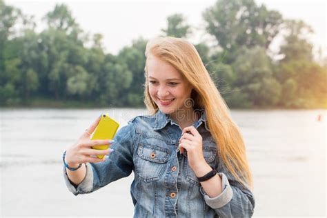 Close Up Portrait Of A Girl Taking Selfies On A Smartphone In Nature Park Stock Image Image