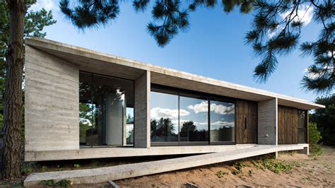 Luciano Kruk Includes Blackened Wood And Patios At Argentinian Home