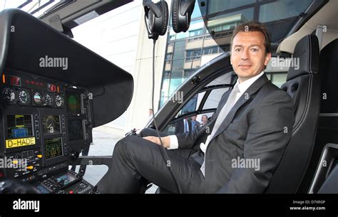 Eurocopter Chairman Guillaume Faury Poses In The Cockpit Of The Ec