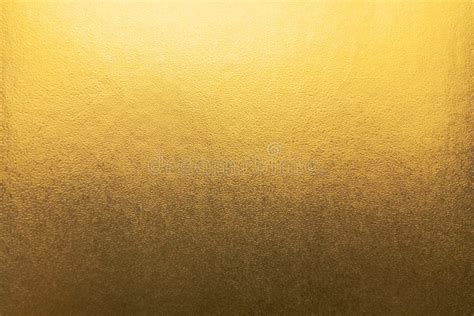 Shiny Yellow Gold Foil Texture Background With Gradient Shadow Stock