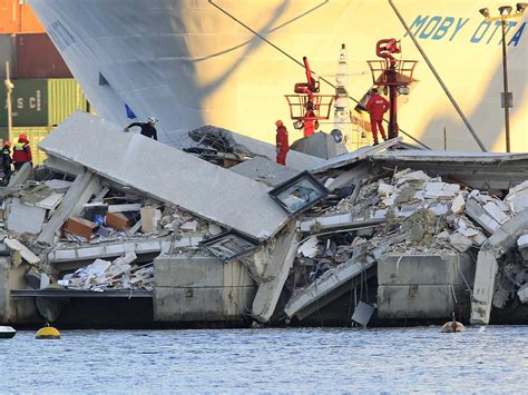 Italy cargo ship crash: Nine people feared dead after collision with