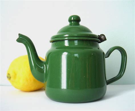 vintage enamelware green teapot