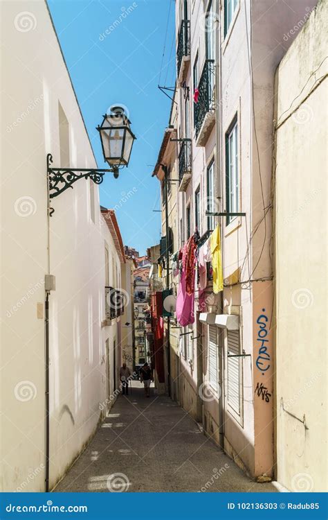 Tourists Exploring the Old Streets of Lisbon City in Portugal Editorial ...