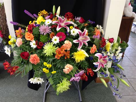 Mixed Spring Casket Spray In Charleston Il Noble Flower Shop