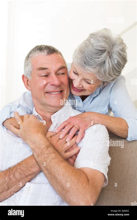 Loving Senior Woman Embracing Husband Stock Photo Alamy