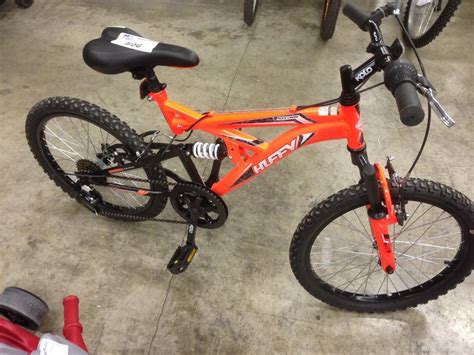 Orange Huffy Rock Creek 6 Speed Full Suspension Mountain Bike