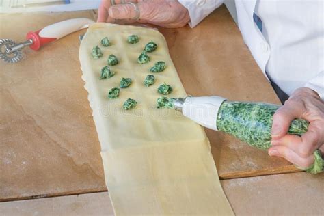 Italian Pasta Preparation Of Tortelli With Spinach And Ricotta Stock