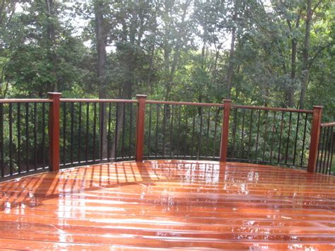 Elevated Curved Ipe Deck In Herndon Va With Spiral Staircase