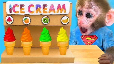 Monkey Baby Bon Bon Doing Shopping In Toy Store And Eats Ice Cream