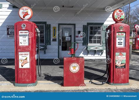 Vintage Texaco Gas Pumps And Classic Car Editorial Image