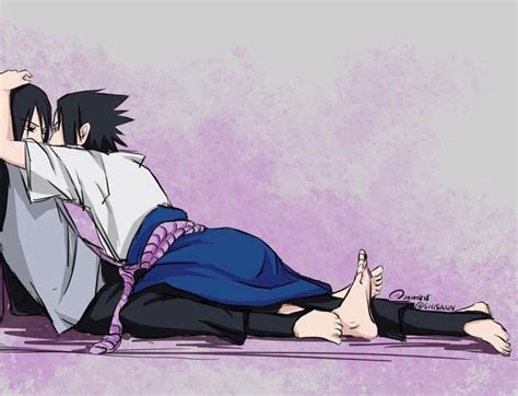 An Anime Character Laying On The Ground With His Arm Around Another