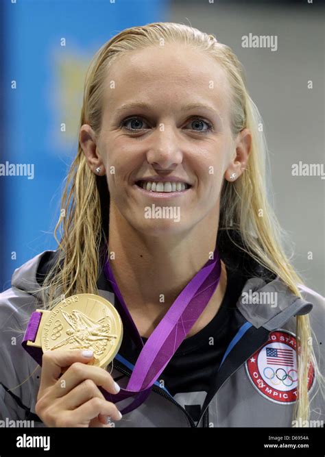 Dana Vollmer of USA poses with her gold medal after winning the women's ...