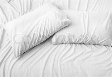 Pillow on the bed, background | Stock image | Colourbox