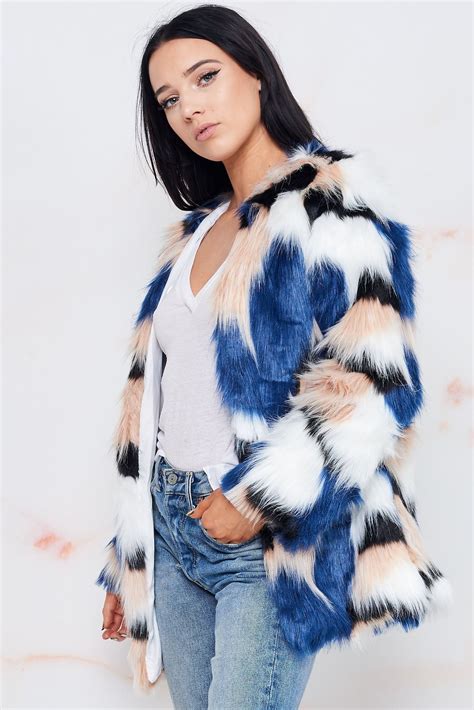 This Thick Multi Colored Faux Fur Jacket Features A Collarless Style With A High Thigh Length