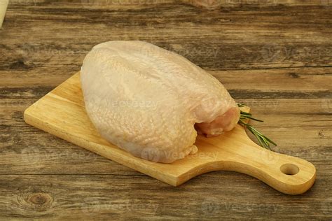 Raw whole chicken breast with skin 34071015 Stock Photo at Vecteezy