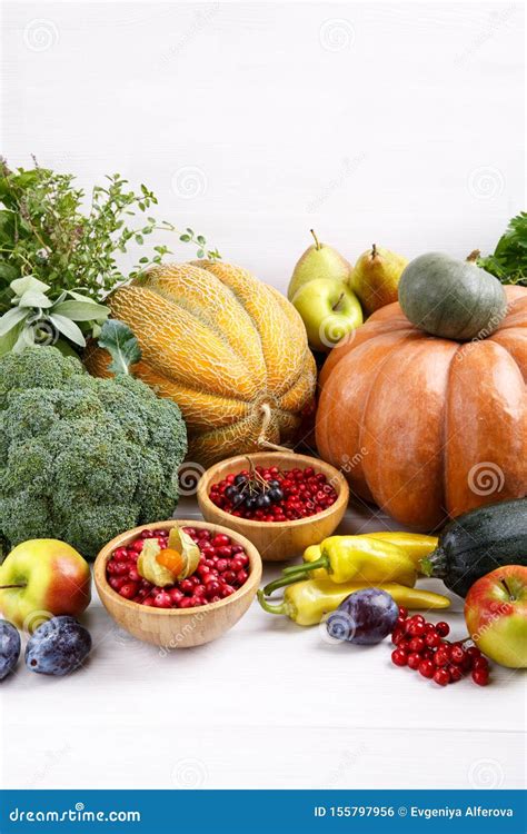 Autumn Harvest Vegetables Fruits Berries And Herbs On White