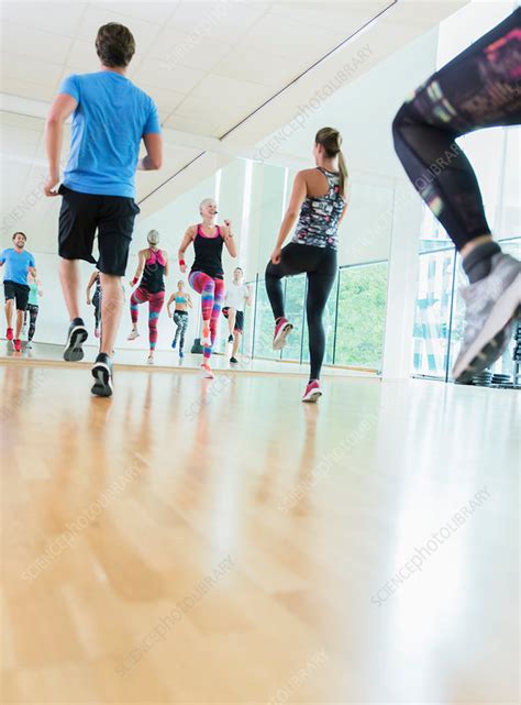 Fitness instructor leading aerobics class - Stock Image - F015/5679 ...