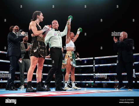 Alycia Baumgardner (right) celebrates victory by knockout against Terri Harper (left) in the ...