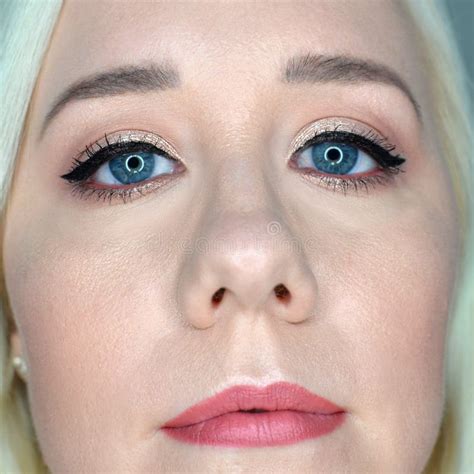 Blonde Haired Woman With Nude Makeup And Winged Liner Stock Image Image Of Glamour Smile