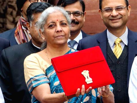 Union Finance Minister Nirmala Sitharaman Carrying The Budget Tablet